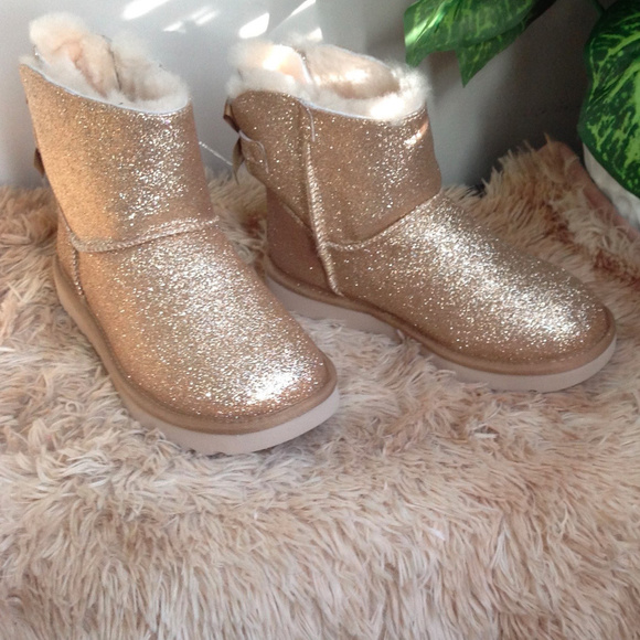 New UGG Mini Bailey Bow Gold Ankle Boots - Picture 2 of 8
